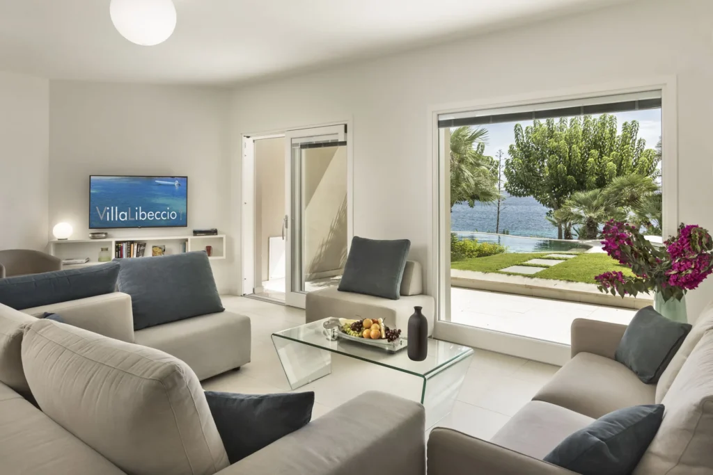 Living room  Villa Libeccio: garden and sea view in Sardinia