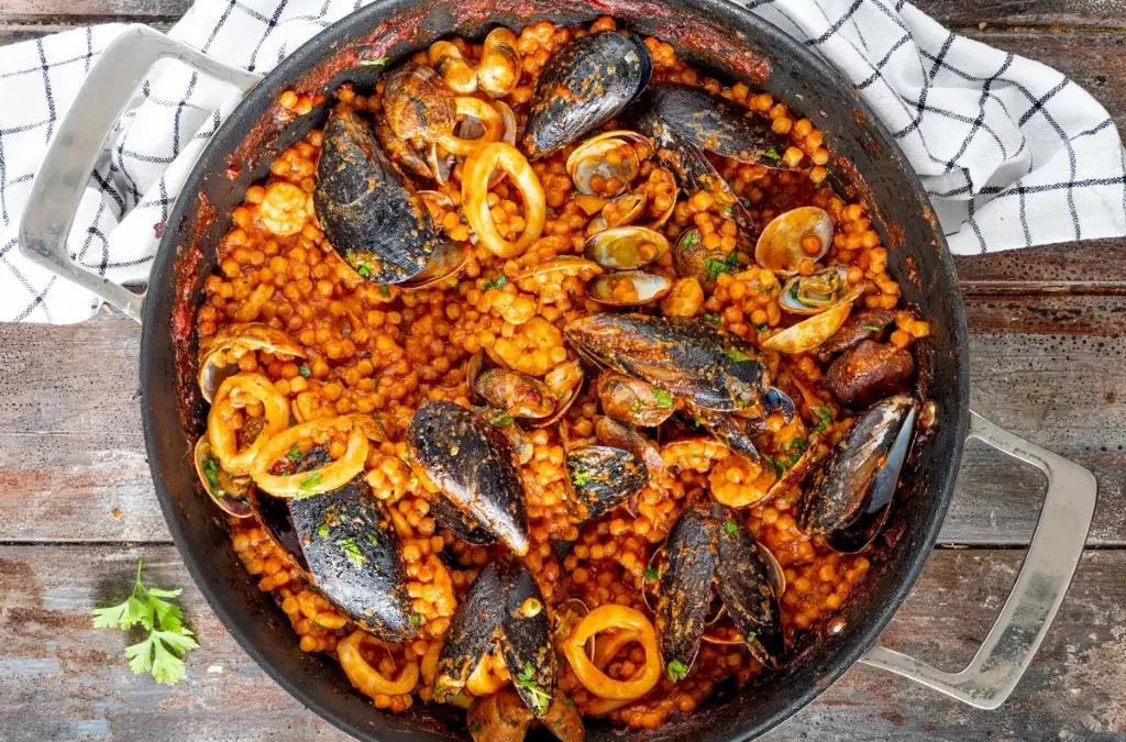 Paella Algherese: Un Viaggio nei Sapori della Sardegna Catalana